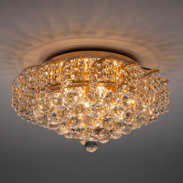 Потолочная люстра Eurosvet Charm 16017/9 золото Strotskis